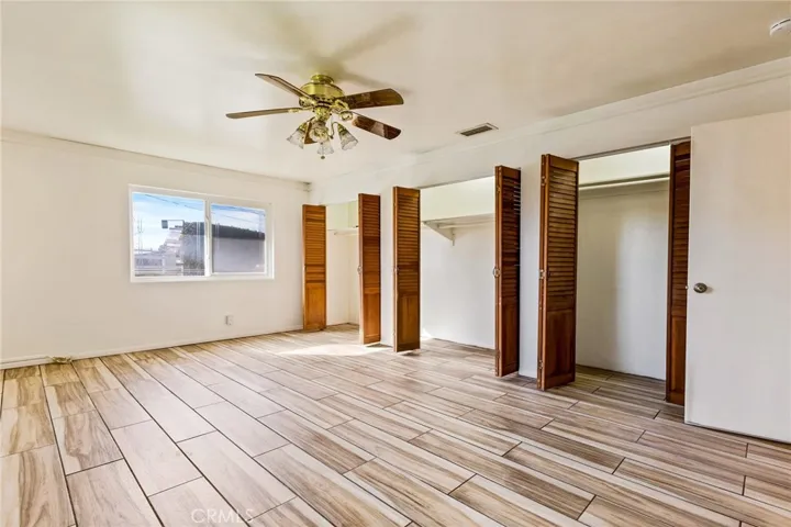 Primary bedroom with plenty of closet space.