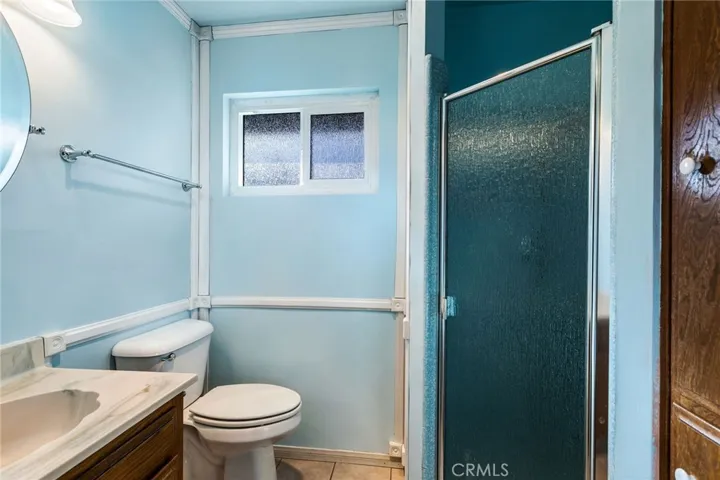 Bathroom with shower with convenient garage/backyard access