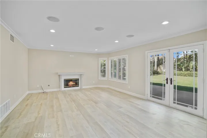 Living room with French doors and fireplace