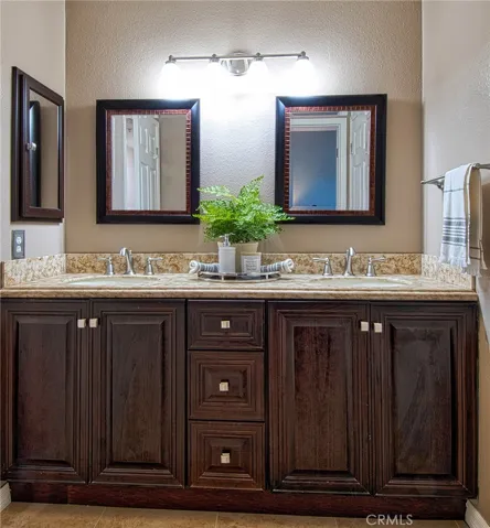 Renovated bathroom with updated finishes.
