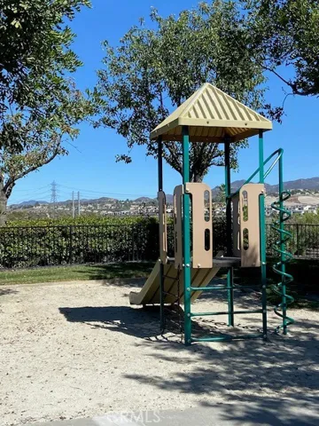 Steps away from playground with 
mountain views.