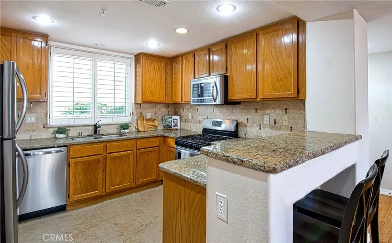 Plenty of cabinets and a well-sized kitchen.