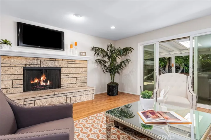 The gorgeous fireplace spans nearly one wall.