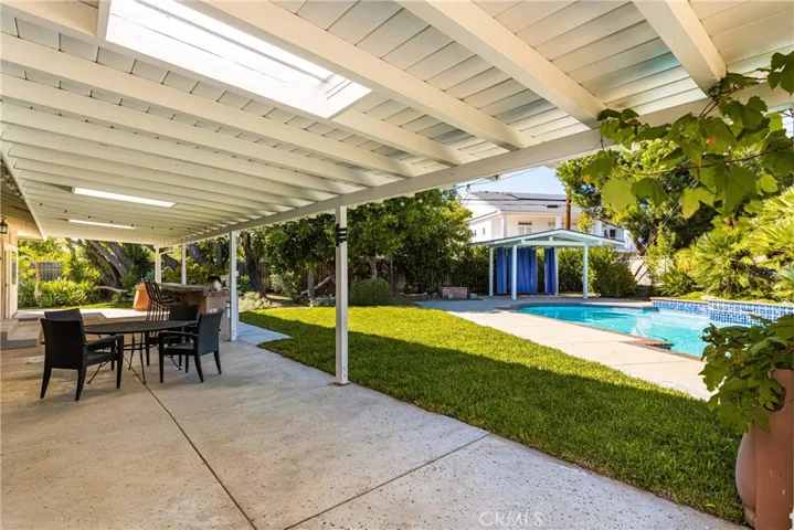 With a patio this large, you could have multiple seating and dining areas.