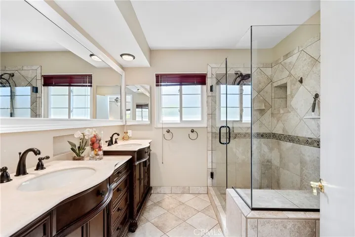 The Master Bath features double sinks and recessed lighting.
