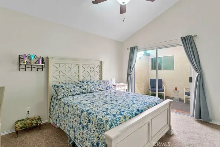 Spacious secondary bedroom with glass slider leading to you own private patio.