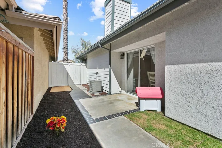 Side patio area off of formal dining area or dog run area.