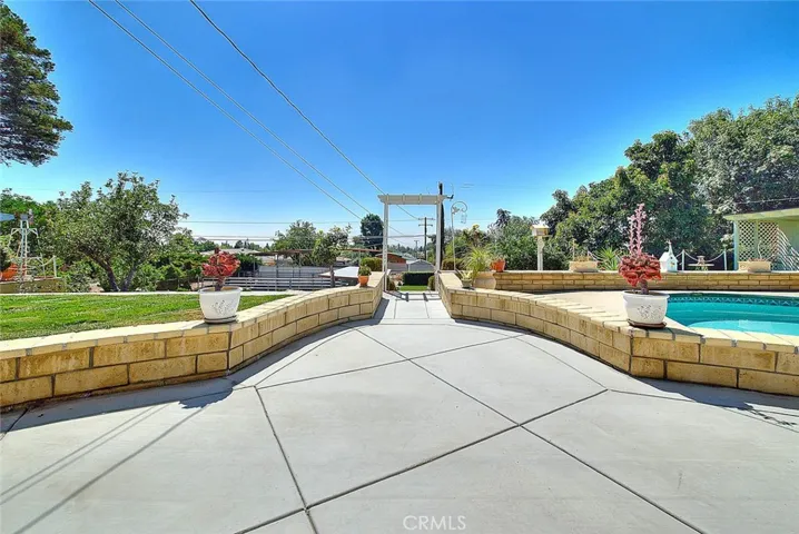 Beautifully redone concrete patio with view of the valley