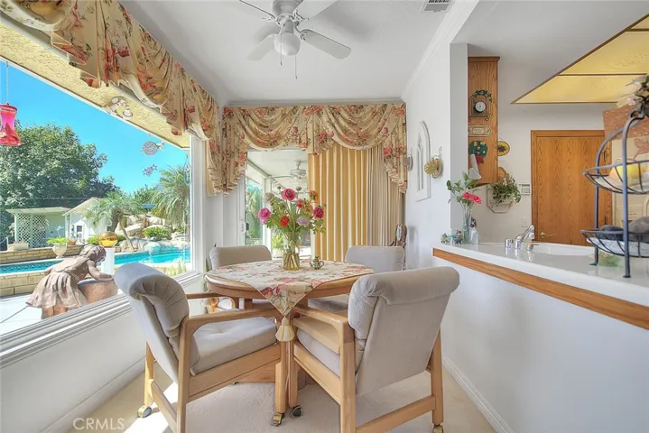 Breakfast nook with a view of the serene pool