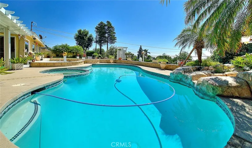 Rock waterfall pool and spa