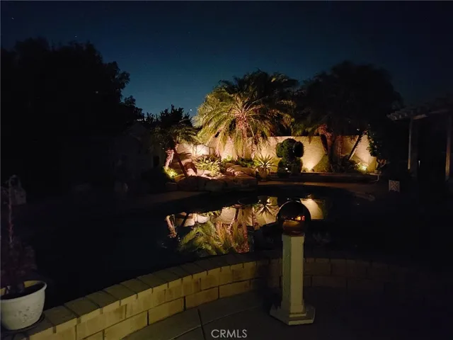 Enjoy the Rock waterfall with lights at night