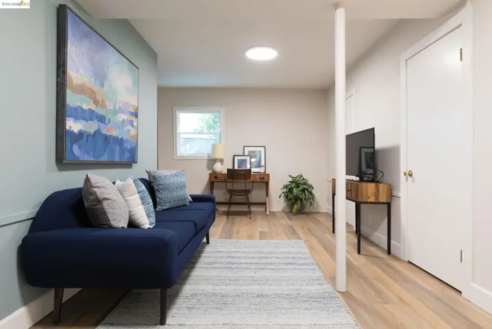 Added dnstairs WITH PERMITS.  Bonus spaces w/potential for family room, media room, office, in Law.