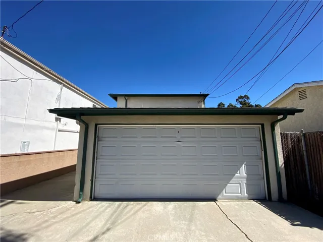 Rear garage share by B & C