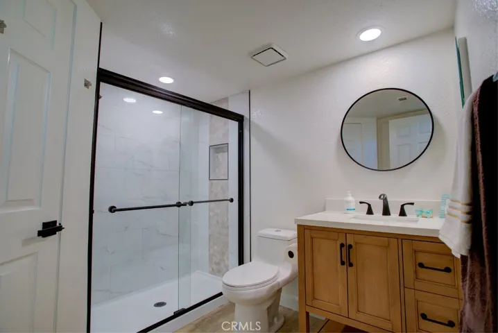 Downstairs bath adjoins to bedroom
