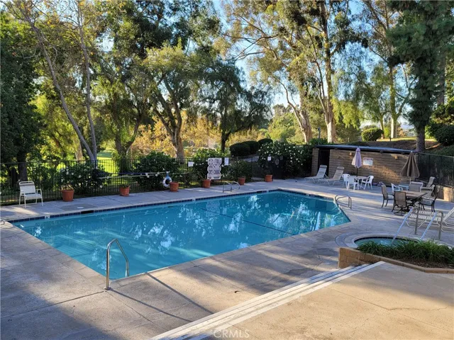 Community pool and jacuzzi. Just steps from the patio area.
