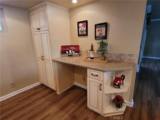 Additional countertops and pantry area in kitchen.