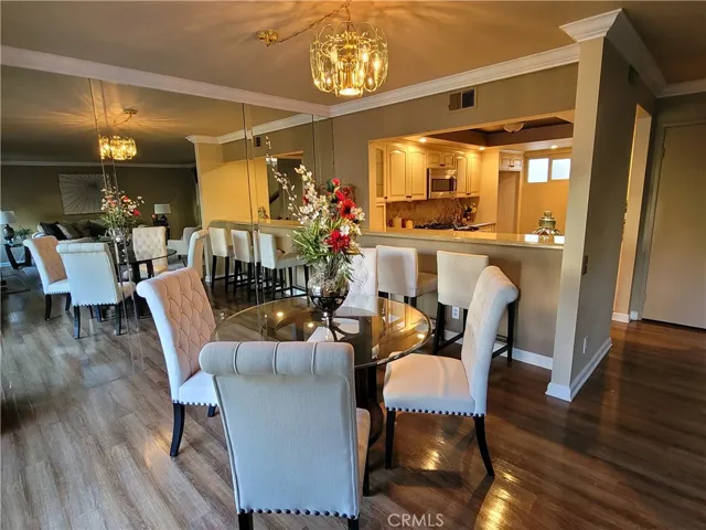 Dining area with view of kitchen.