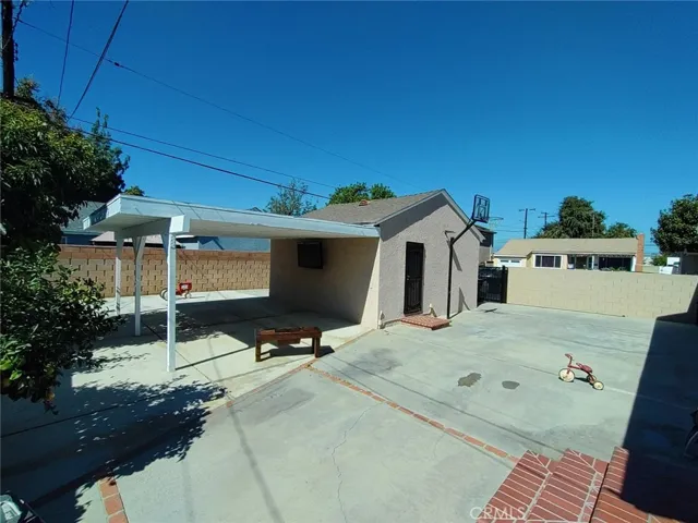 Paved Back Yard, with Patio Cover.