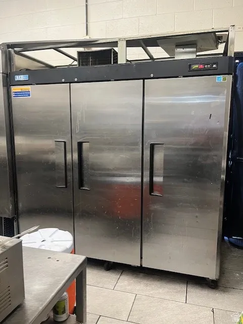 2592.Kitchen featuring stainless steel refrigerator