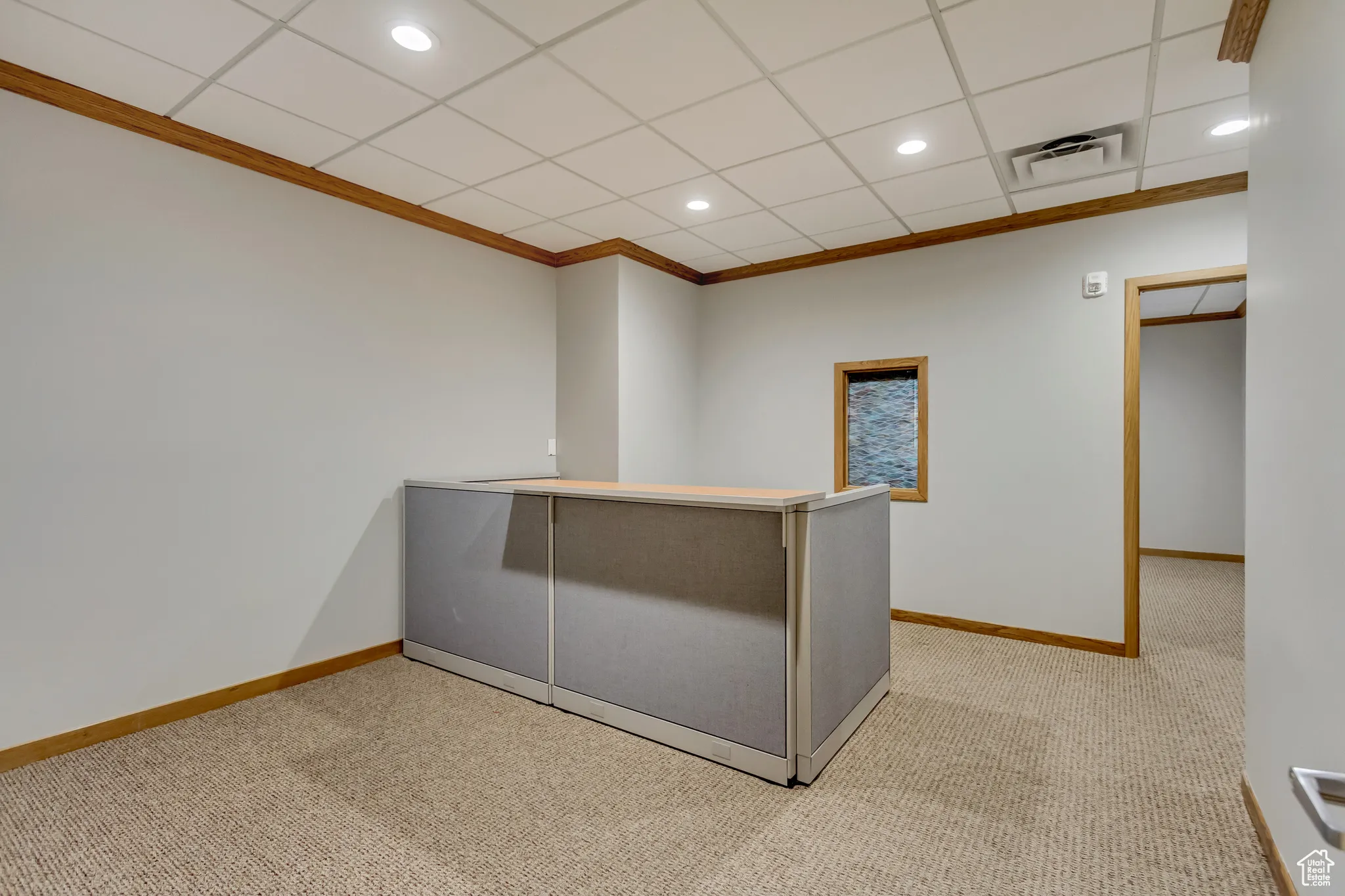 Bar with recessed lighting, visible vents, light carpet, crown molding, and baseboards