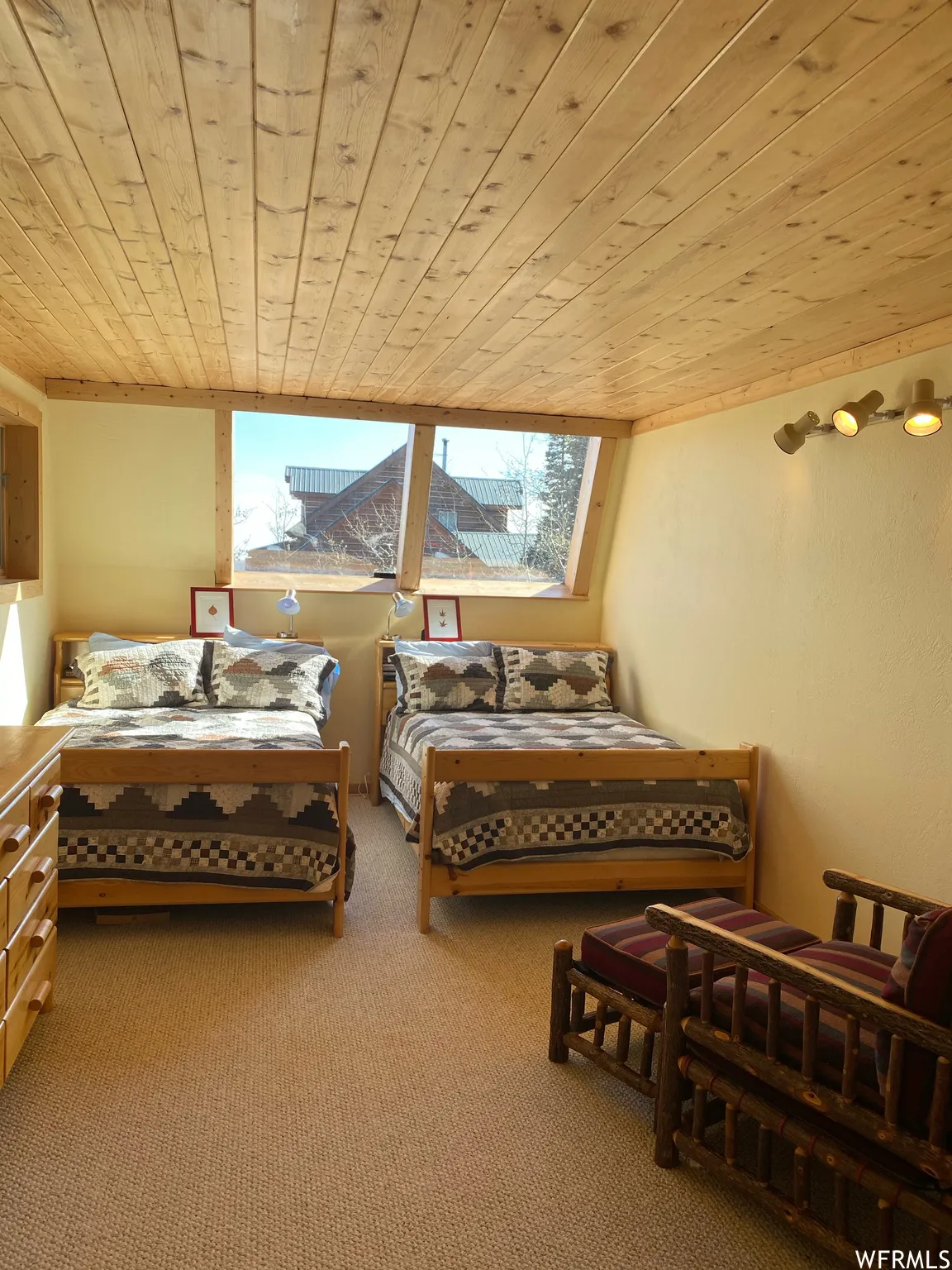 Basement features two bedrooms with two queens in each plus a den.