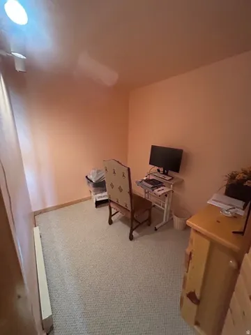 This is the den--good for an office,  No window or closet.