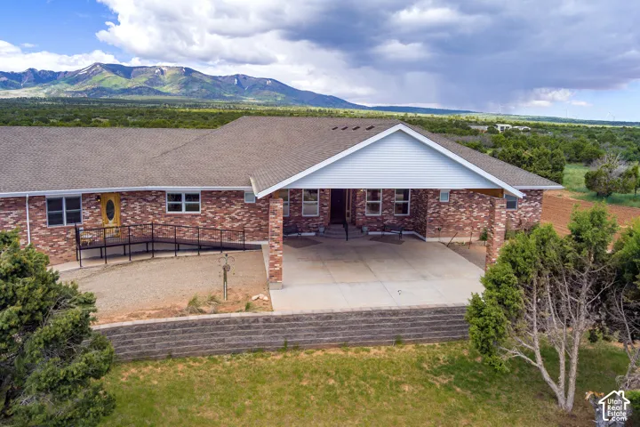 View of front of house with a mountain view