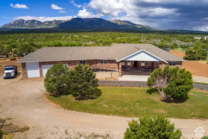 View of front of property with a mountain view