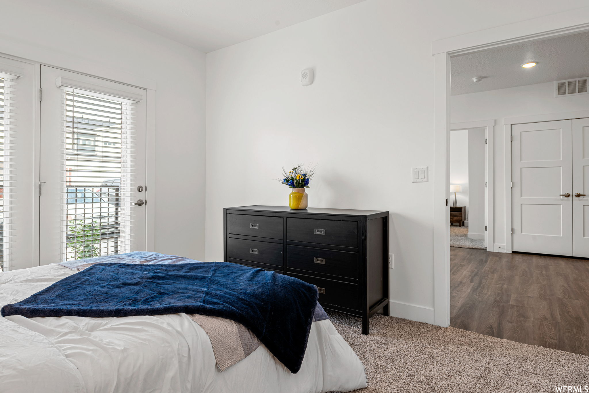 Bedroom featuring wood-type flooring