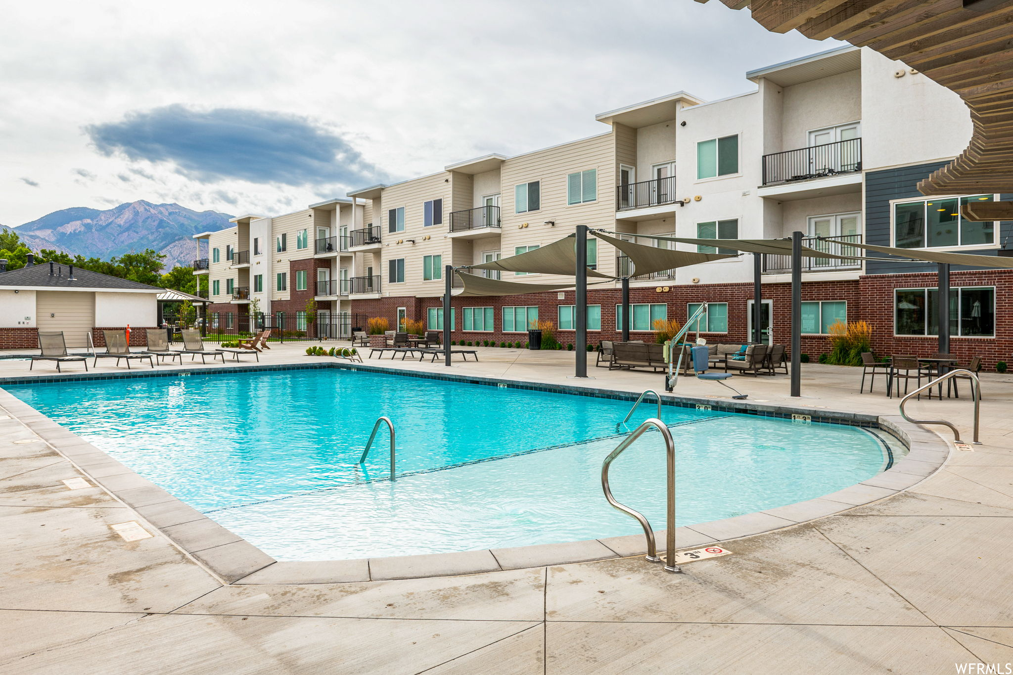 View of pool featuring a patio