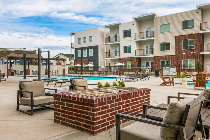 Exterior space with pool and balcony
