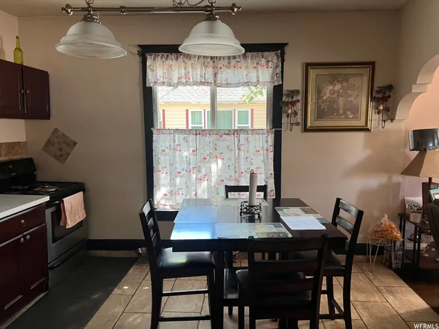Dining room featuring tile floors