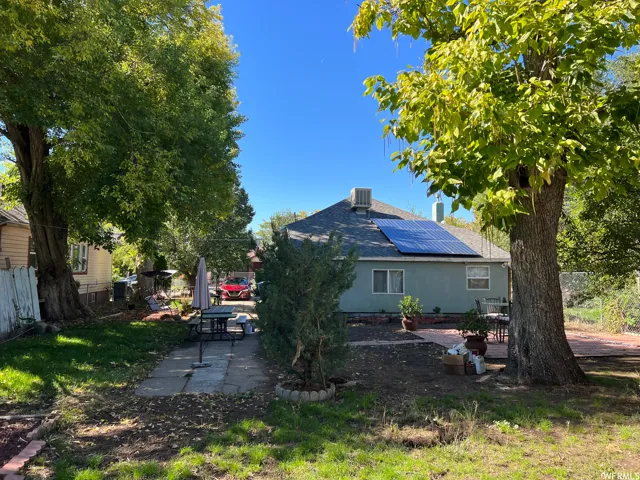 View of yard with central air condition unit