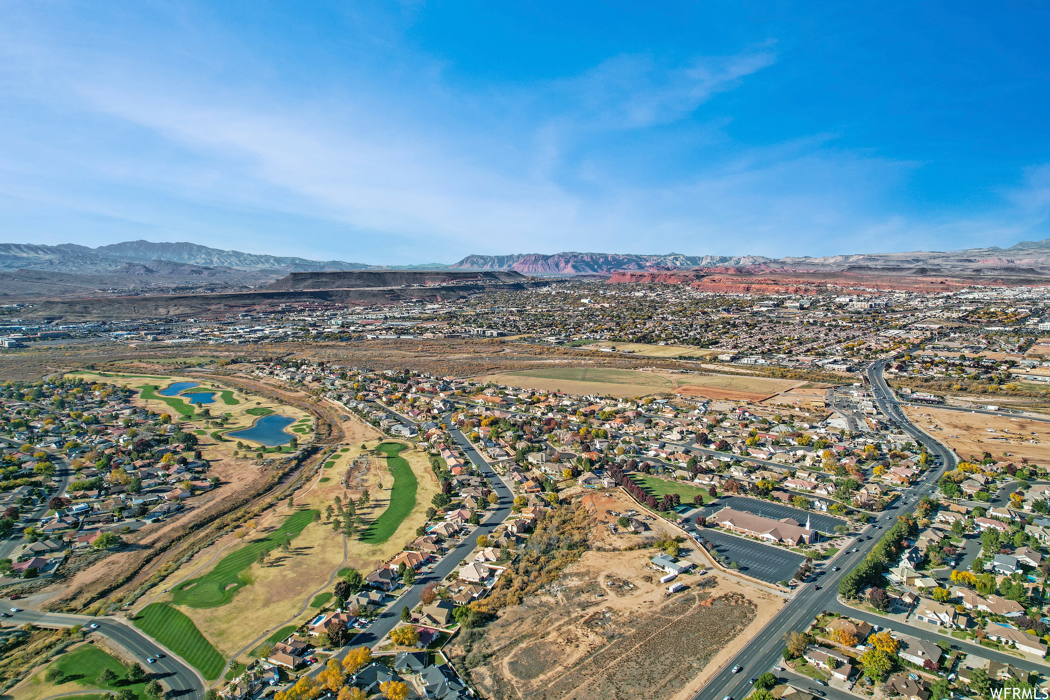 Birds eye view of property with a mountain view