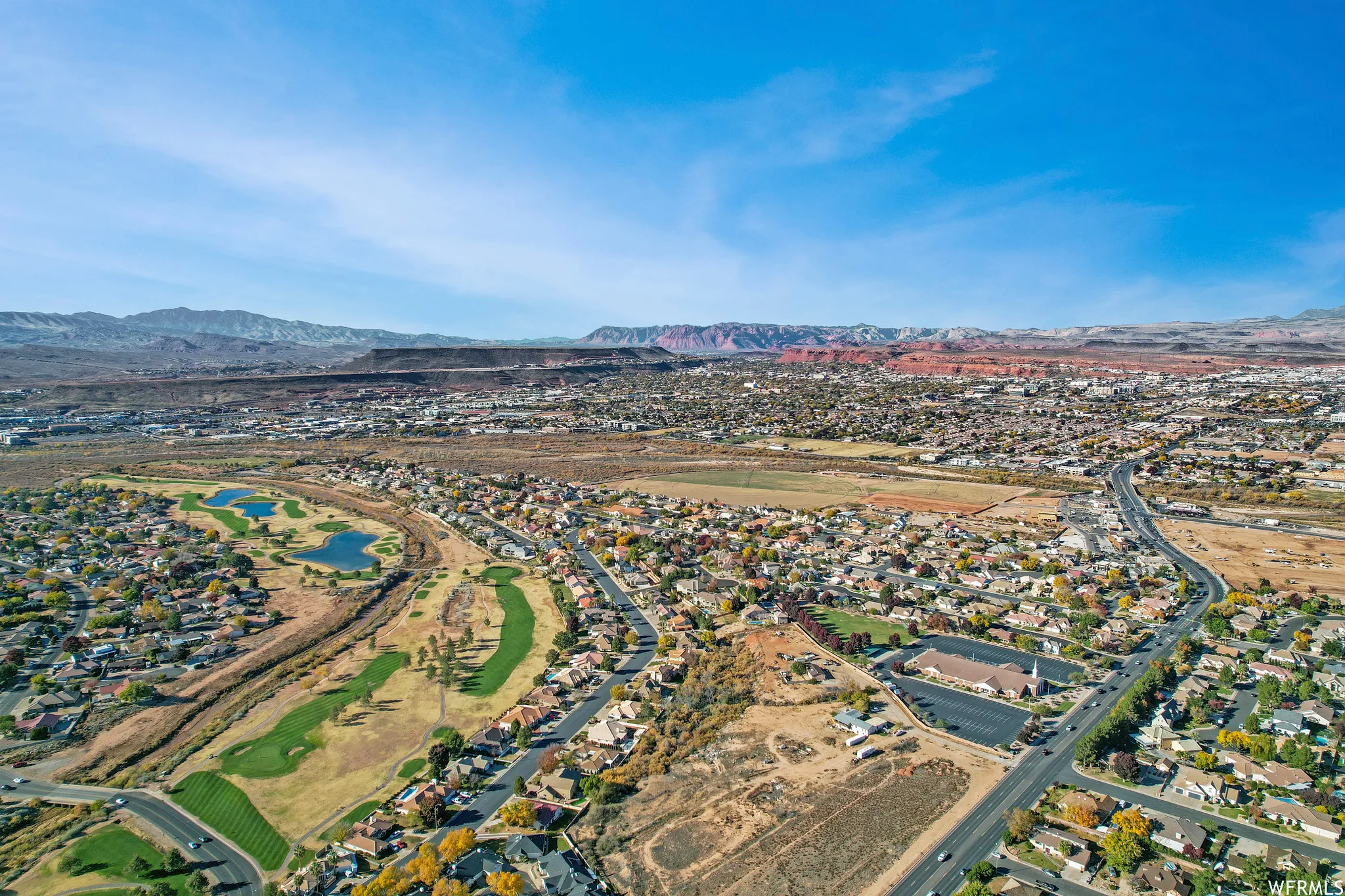 Birds eye view of property with a mountain view