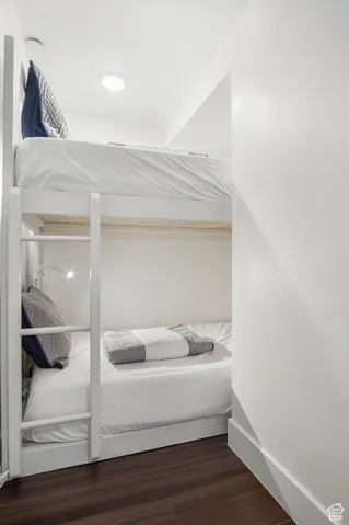 Bedroom featuring dark hardwood / wood-style floors