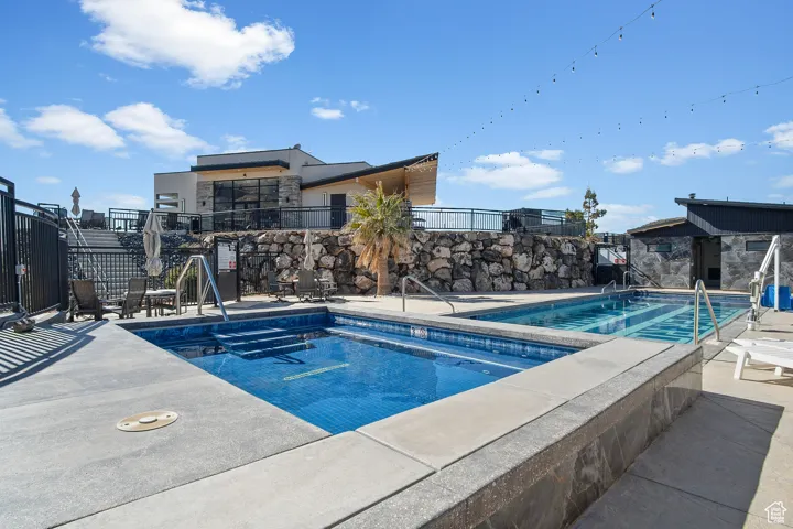 View of pool with a patio