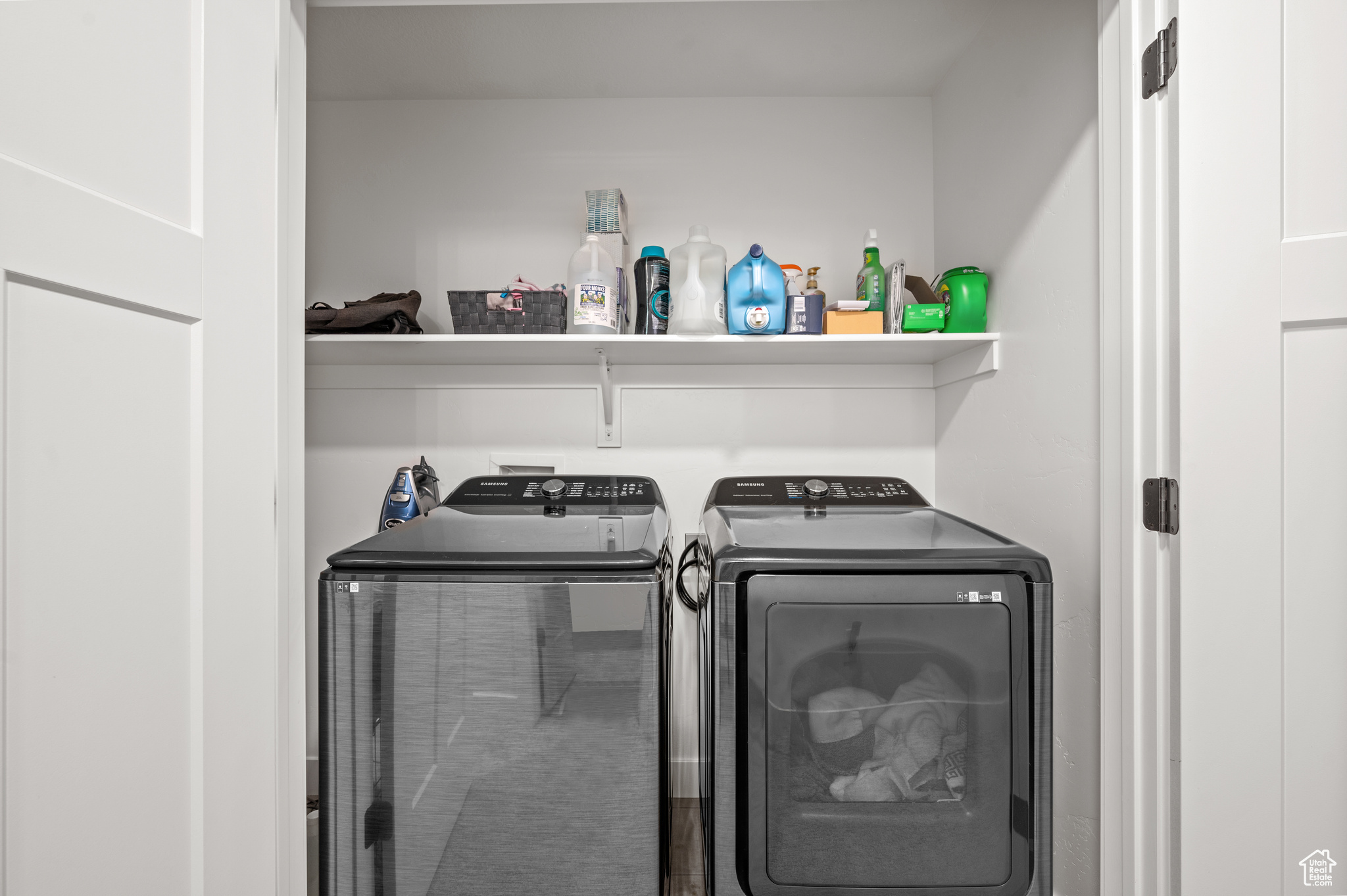 Laundry area with separate washer and dryer