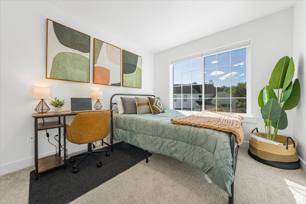 View of carpeted bedroom