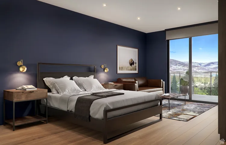 Bedroom with access to outside and light hardwood / wood-style floors