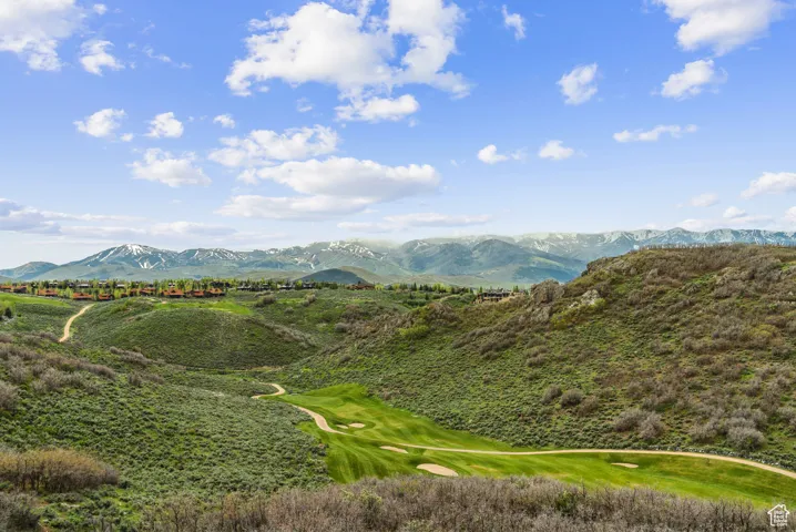 View of mountain backdrop with a local golf course