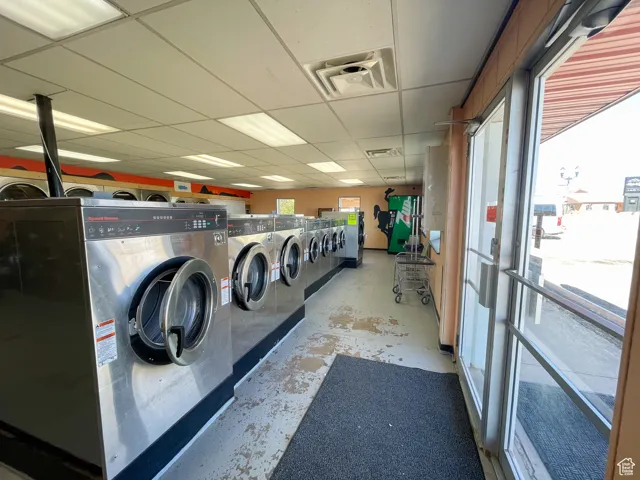Laundry area featuring washing machine and clothes dryer