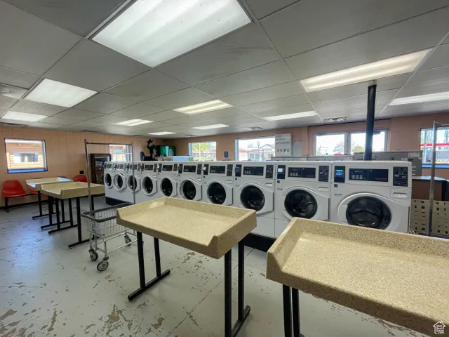 Interior space with a wealth of natural light and washing machine and clothes dryer