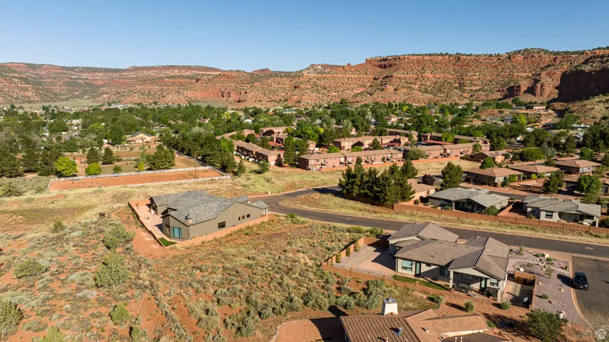 Birds eye view of property with a mountain view
