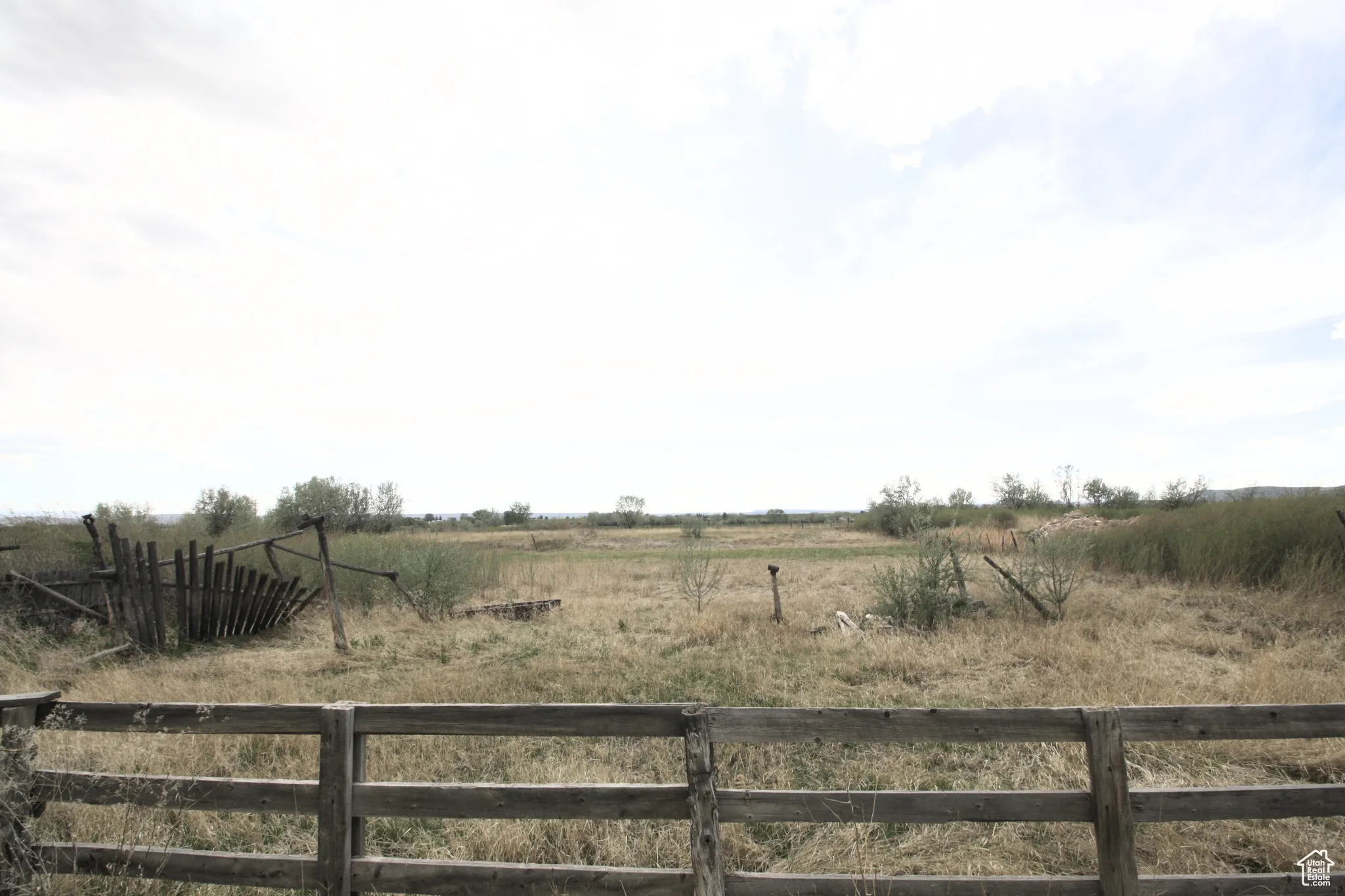 View of yard with a rural view