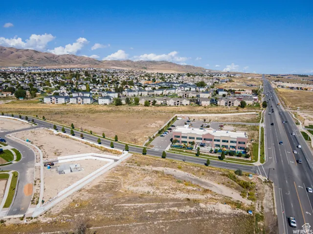 Drone / aerial view featuring a mountain view