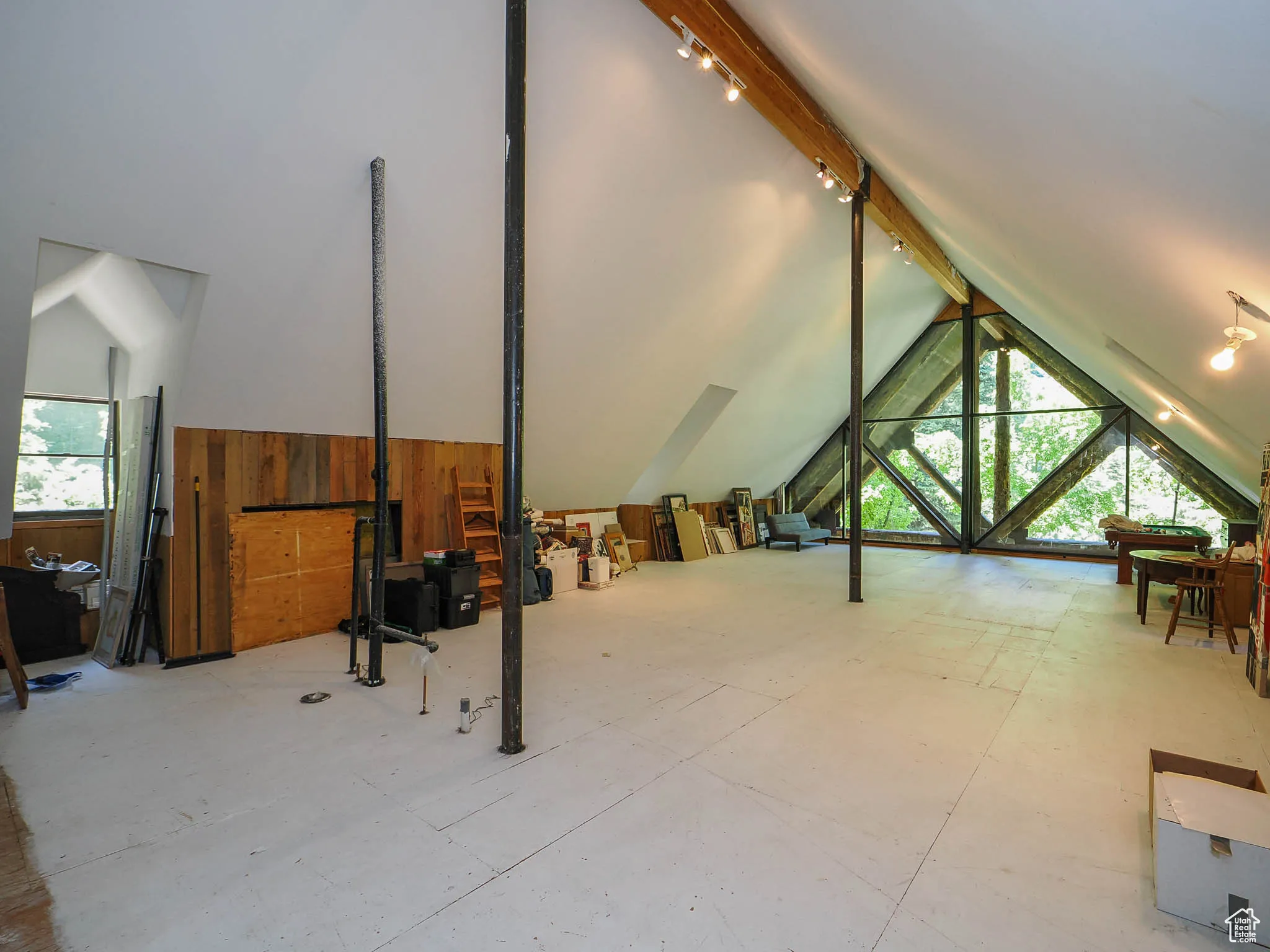 The Western end of the attic offers tremendous natural light and mountain views