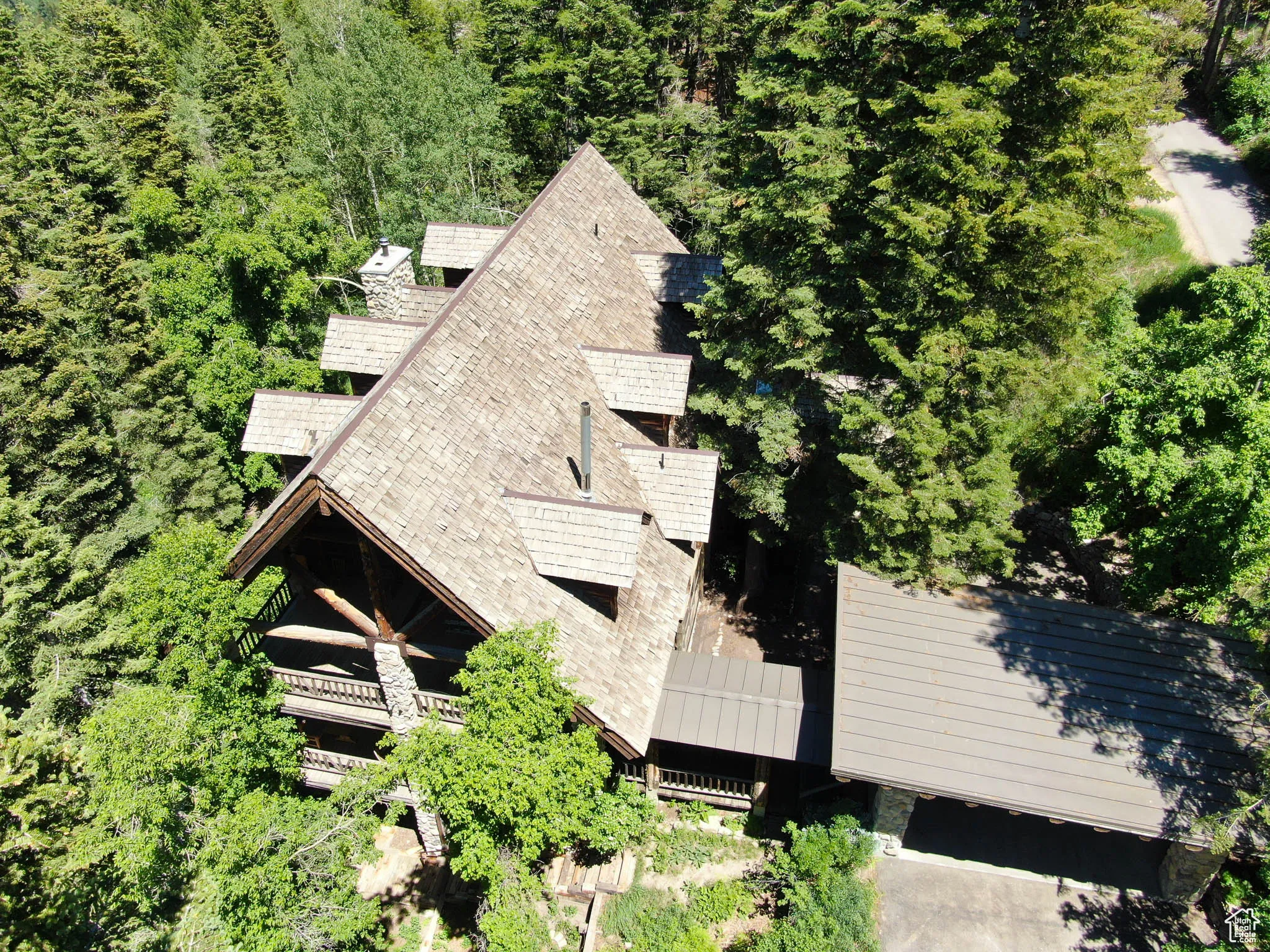 Log and river stone architectural details of the West side