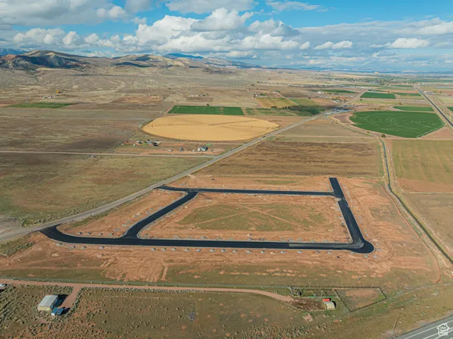 Aerial view featuring a mountain view and a rural view