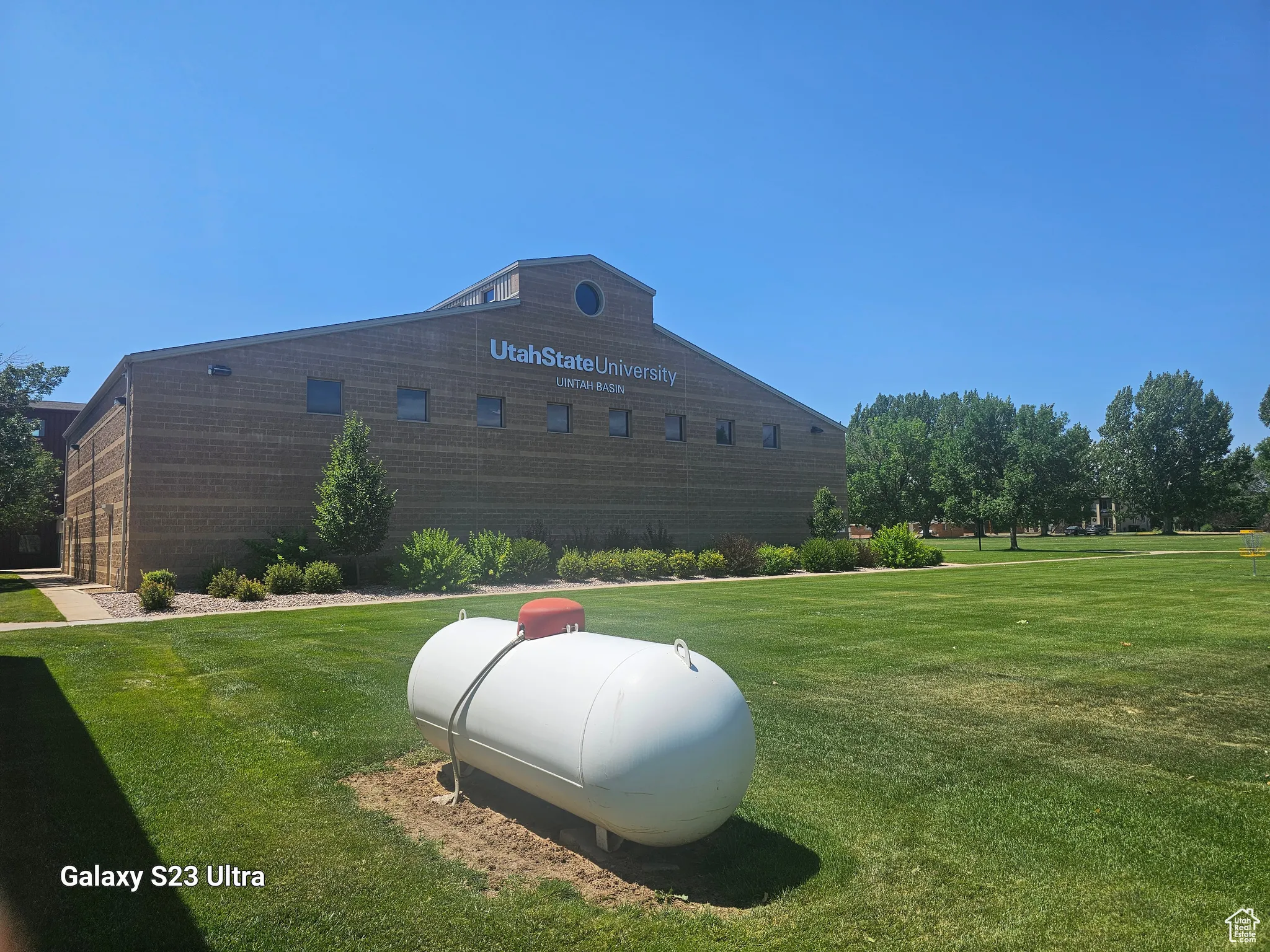 Exterior space featuring a yard